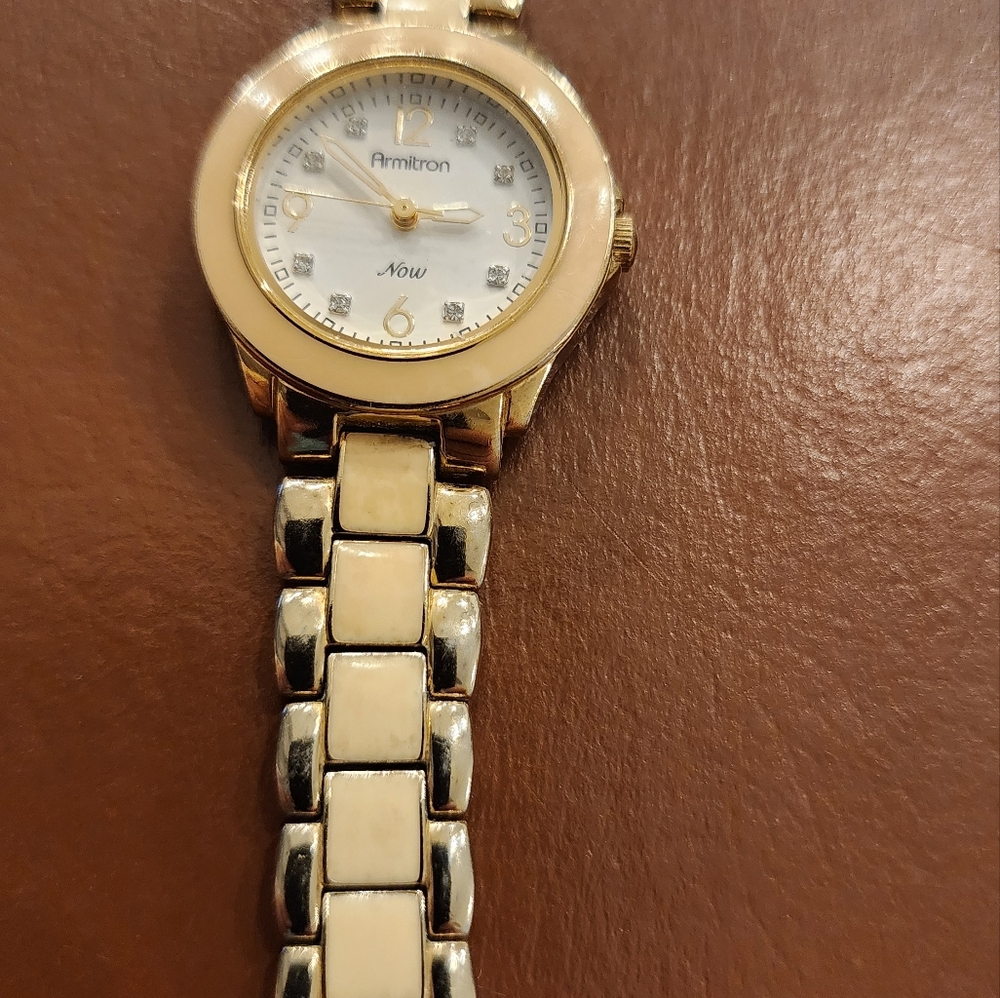 Armitron Now Ladies, Wristwatch Gold and Ivory in color. Serviced and New Batter
